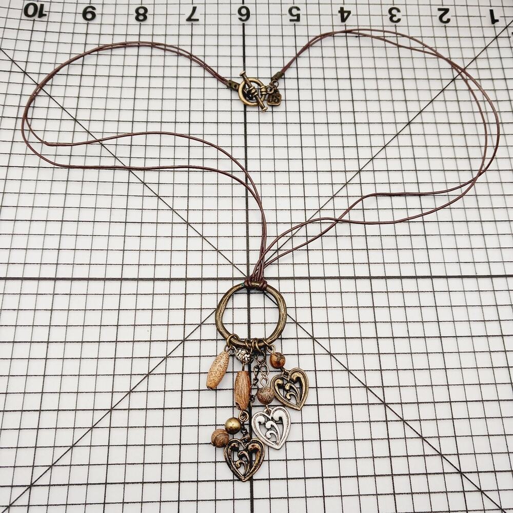 Necklace Jessica Simpson Leatherette Wood Bead Charm Pendant Statement Heart 23